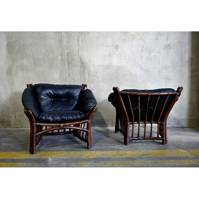 Paire de fauteuils vintage en cuir et rotin 1970