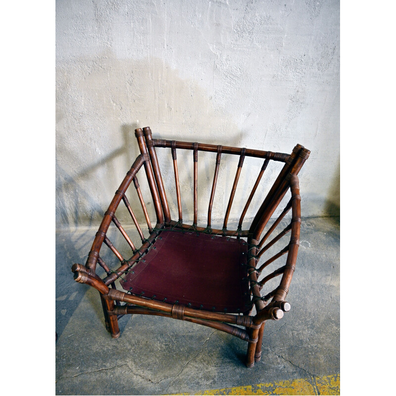 Paire de fauteuils vintage en cuir et rotin 1970