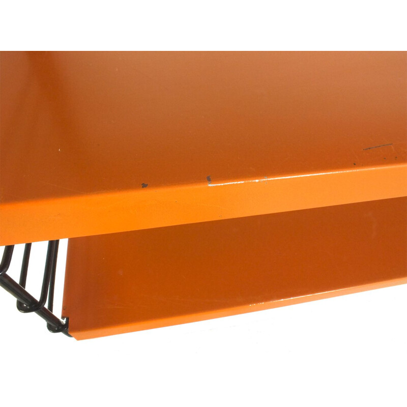 Orange coloured metal shelving 1970s
