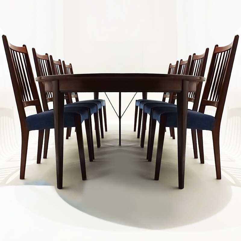 Danish Mid Century extending rosewood dining table and 8 Arne Hovmand Olsen teak dining chairs