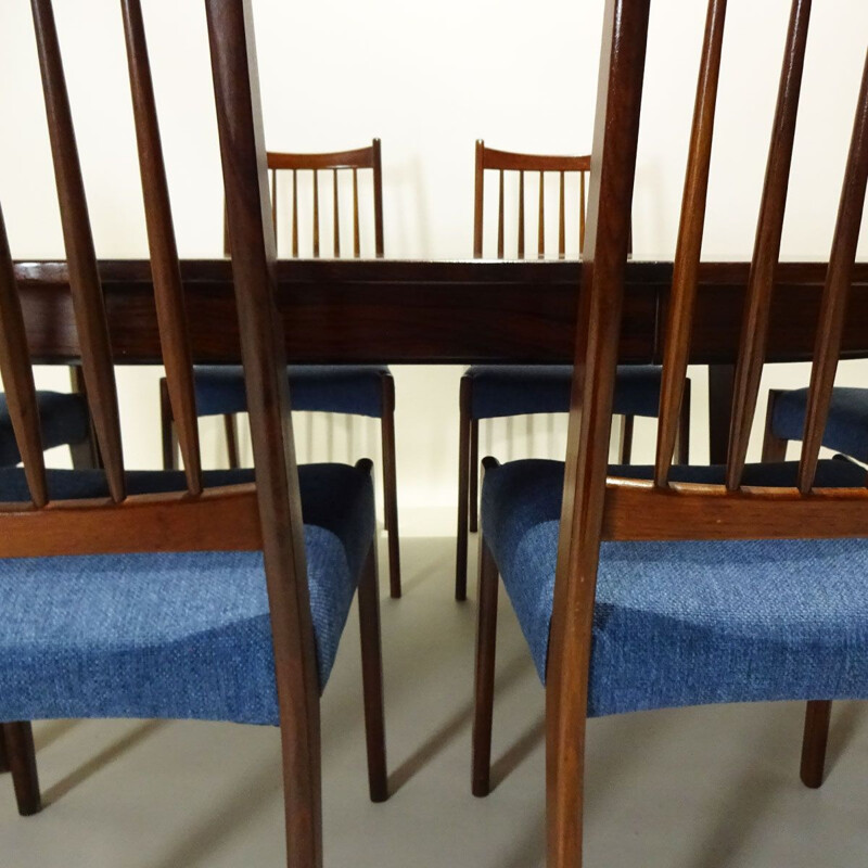 Danish Mid Century extending rosewood dining table and 8 Arne Hovmand Olsen teak dining chairs