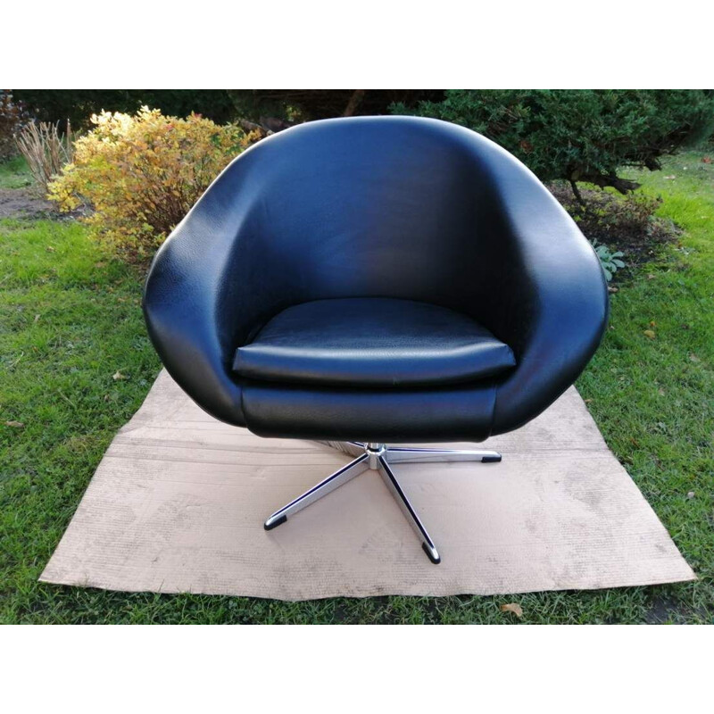 Vintage swivel blue armchair