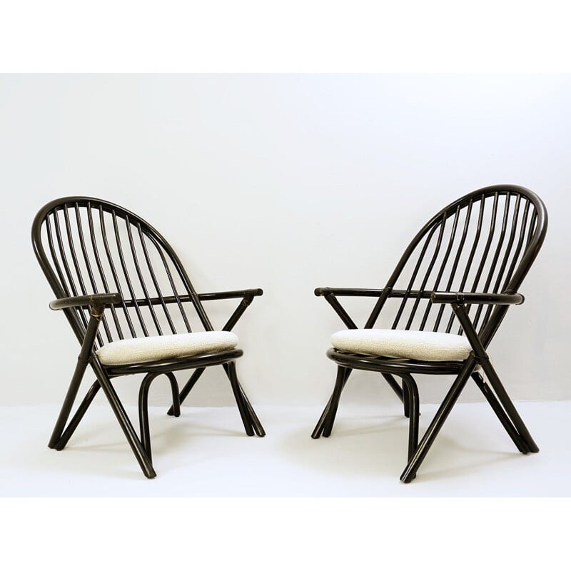 Pair of vintage black lacquered rattan armchairs