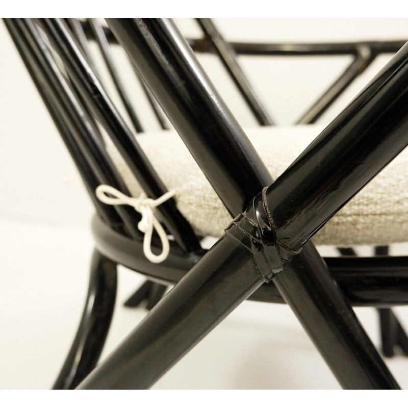Pair of vintage black lacquered rattan armchairs