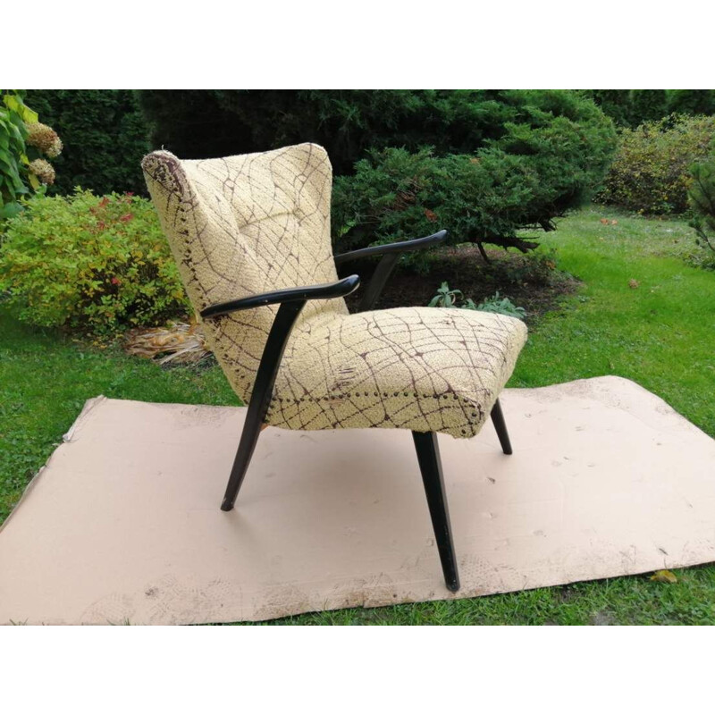 Vintage armchair on straight legs