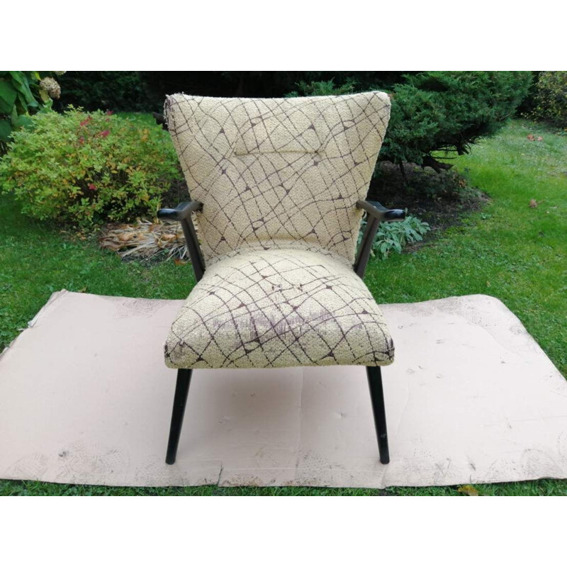 Vintage armchair on straight legs