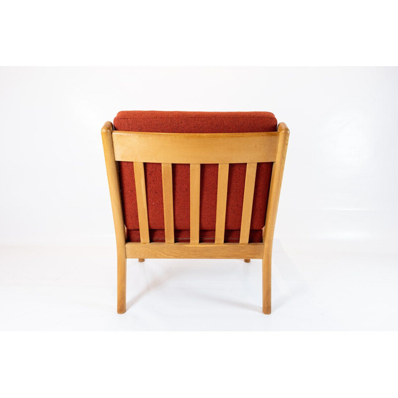 Vintage red wool and oak armchair by Hans J. Wegner by Getama 1960