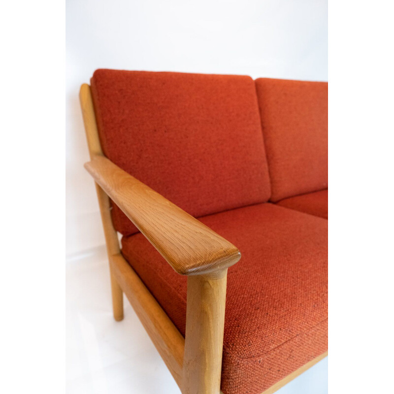 Vintage 3-seater sofa in oak and red wool fabric by Hans J. Wegner and Getama 1960