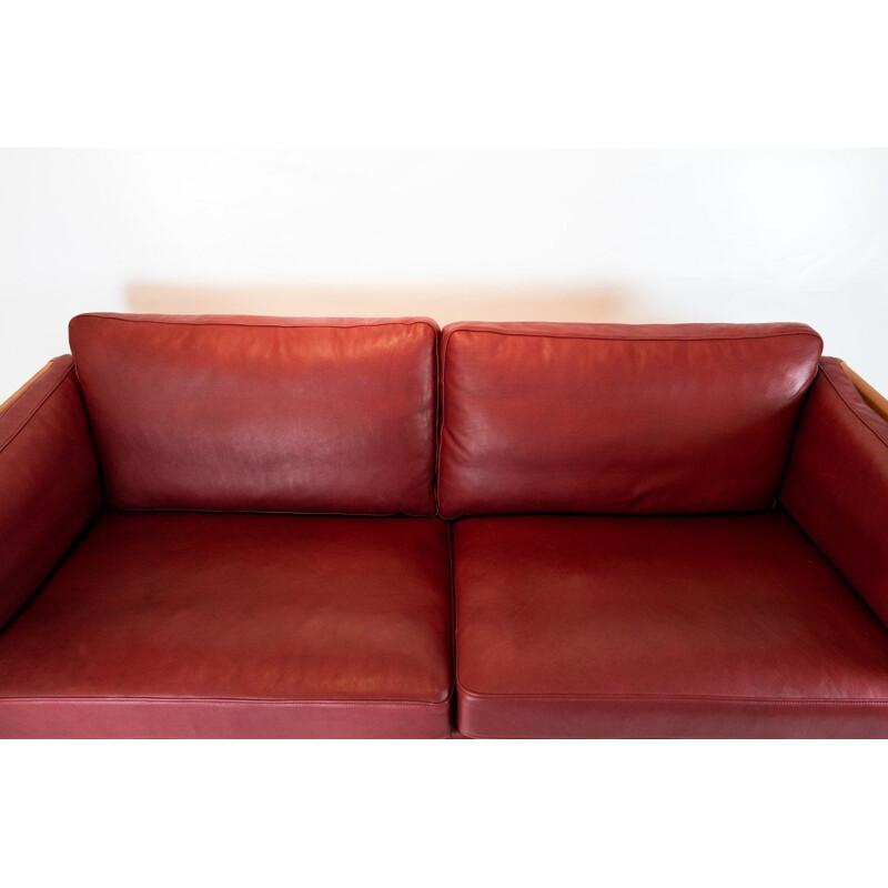 Vintage 2 seater sofa upholstered in Indian red leather, Denmark 1960