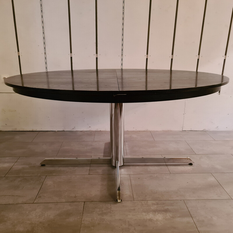 Vintage dining table in blackened wood and chrome base