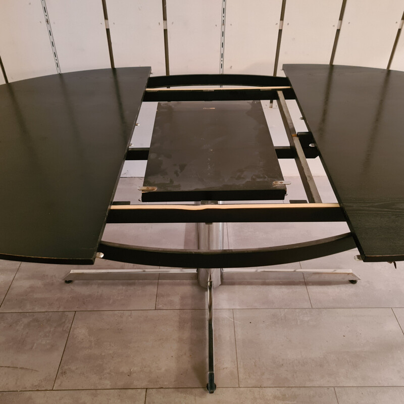 Vintage dining table in blackened wood and chrome base