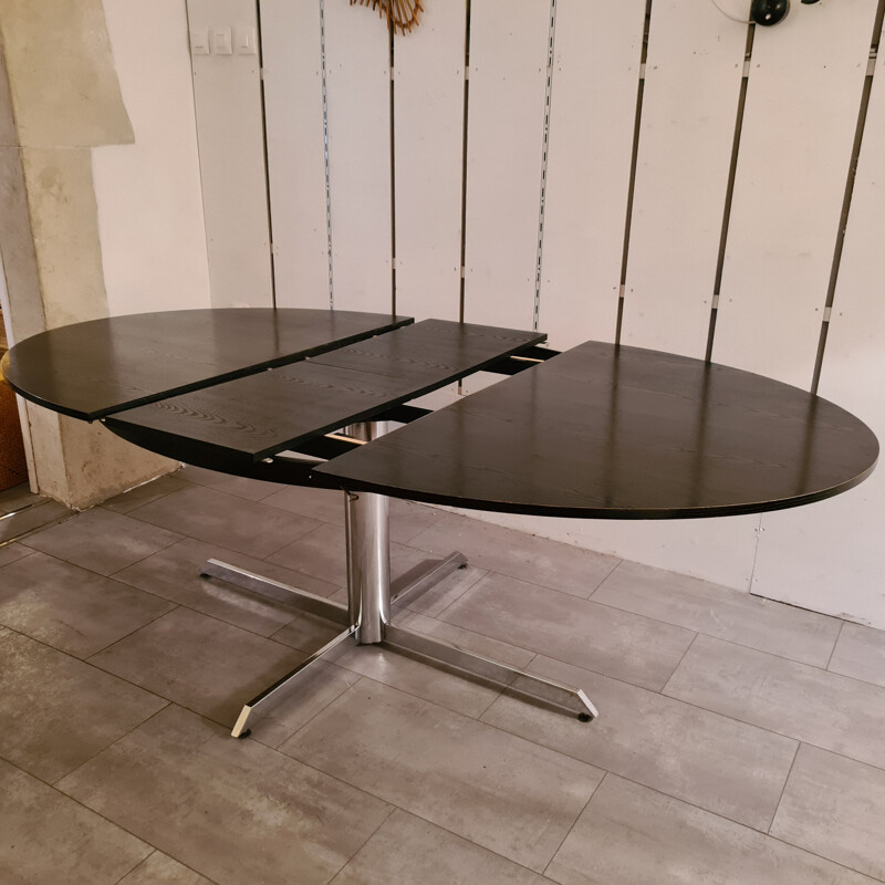 Vintage dining table in blackened wood and chrome base