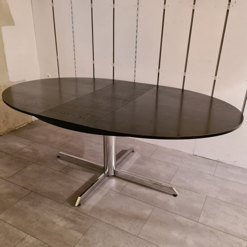 Vintage dining table in blackened wood and chrome base