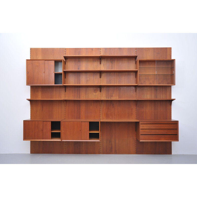 Vintage Poul Cadovius wall system by Cado in teak with writing shelve