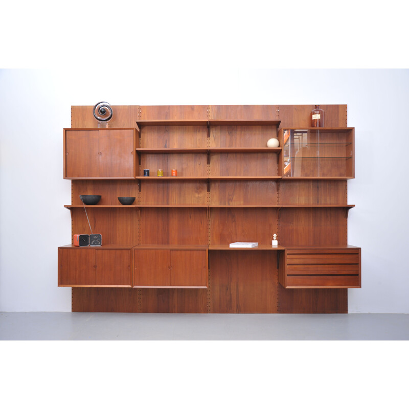 Vintage Poul Cadovius wall system by Cado in teak with writing shelve