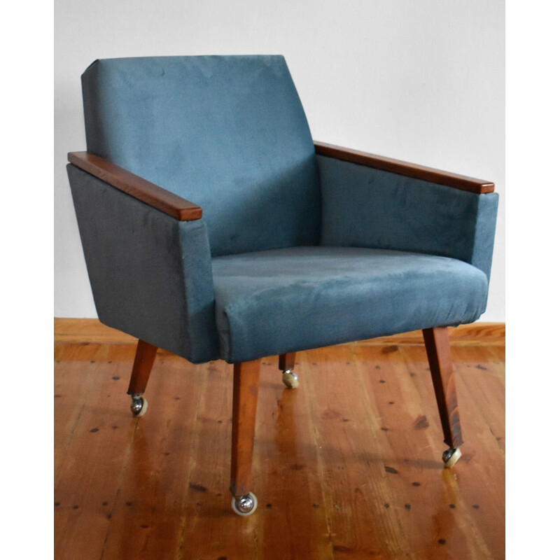 Vintage armchair on straight legs