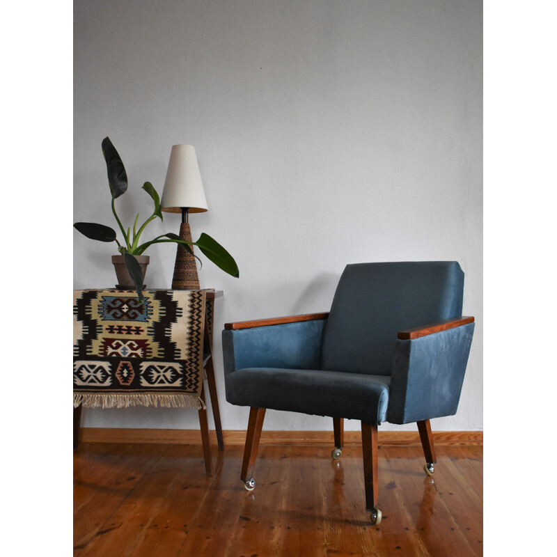 Vintage armchair on straight legs