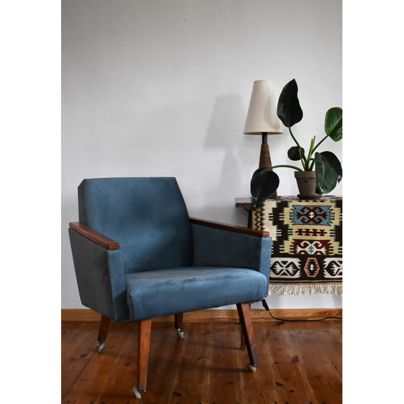 Vintage armchair on straight legs