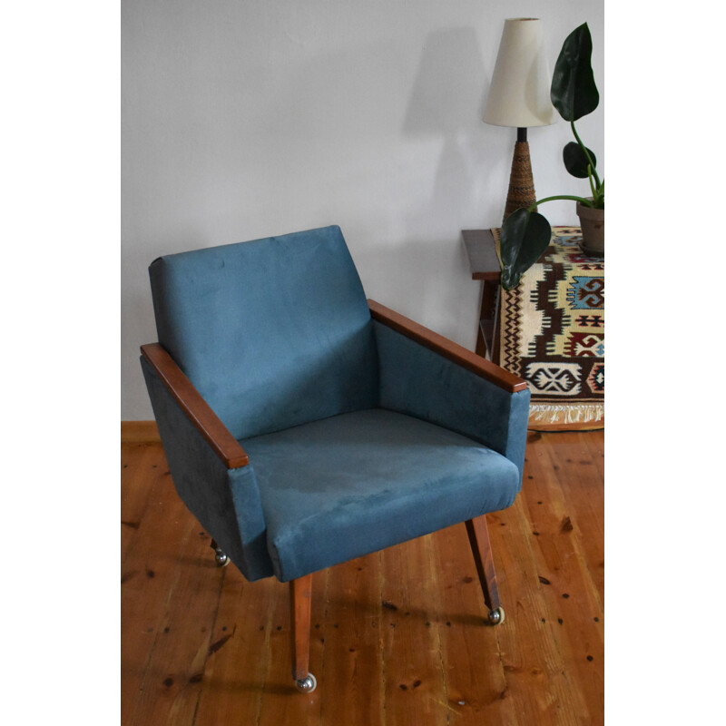 Vintage armchair on straight legs