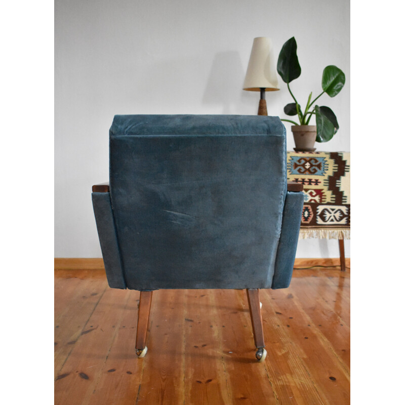 Vintage armchair on straight legs