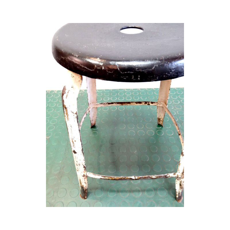 Vintage industrial steel stool with patina