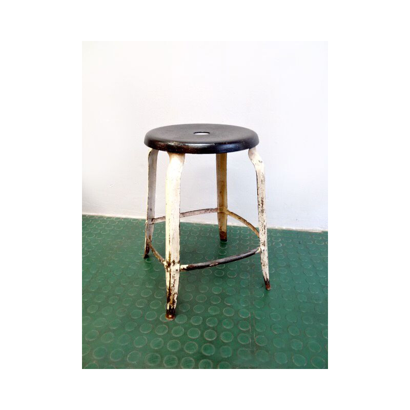 Vintage industrial steel stool with patina