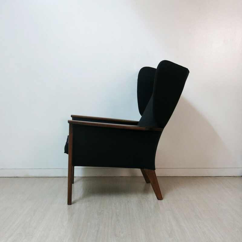 Fauteuil "Wingback" Parker Knoll en tissu noir et teck - 1960