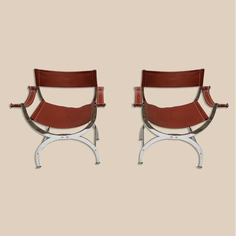 Pair of vintage curules chairs in leather and chromed metal, 1970