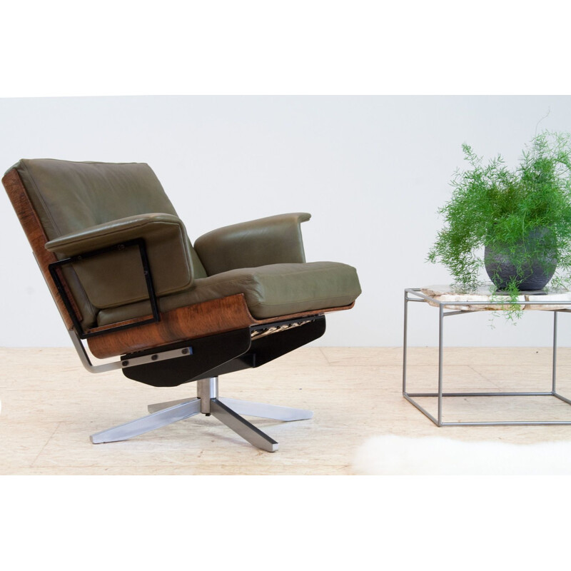 Vintage swivel lounge armchair in green full grain leather and rosewood 1960