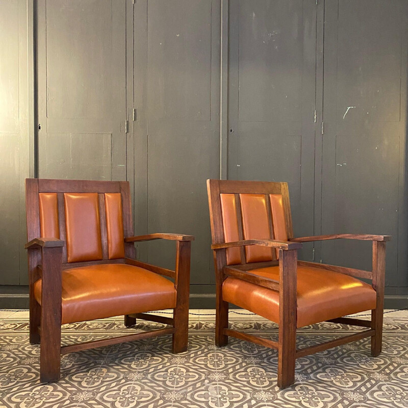 Pair of vintage colonial gold leather armchairs, France 1944