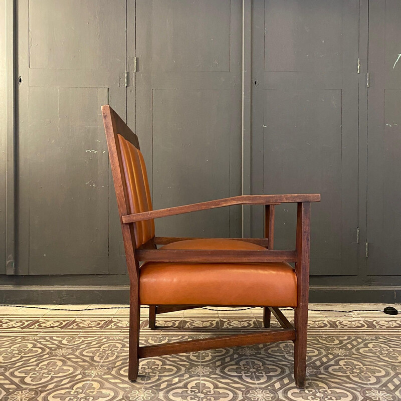 Pair of vintage colonial gold leather armchairs, France 1944