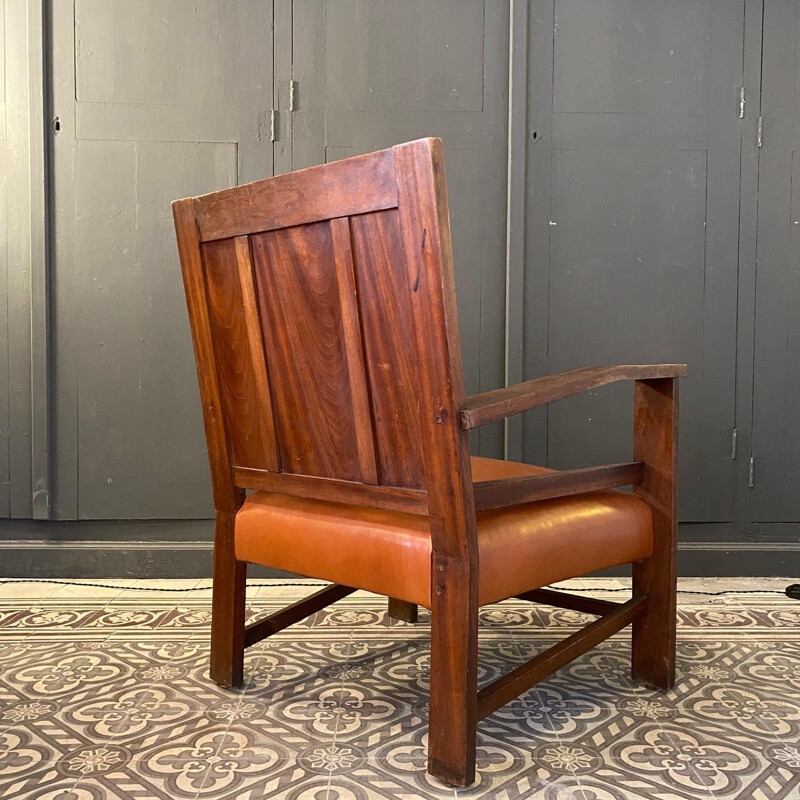 Pair of vintage colonial gold leather armchairs, France 1944