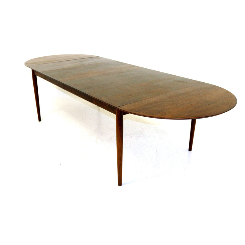 Vintage rosewood dining table by Arne Vodder