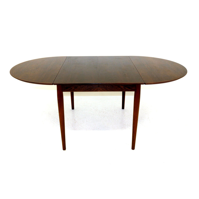 Vintage rosewood dining table by Arne Vodder