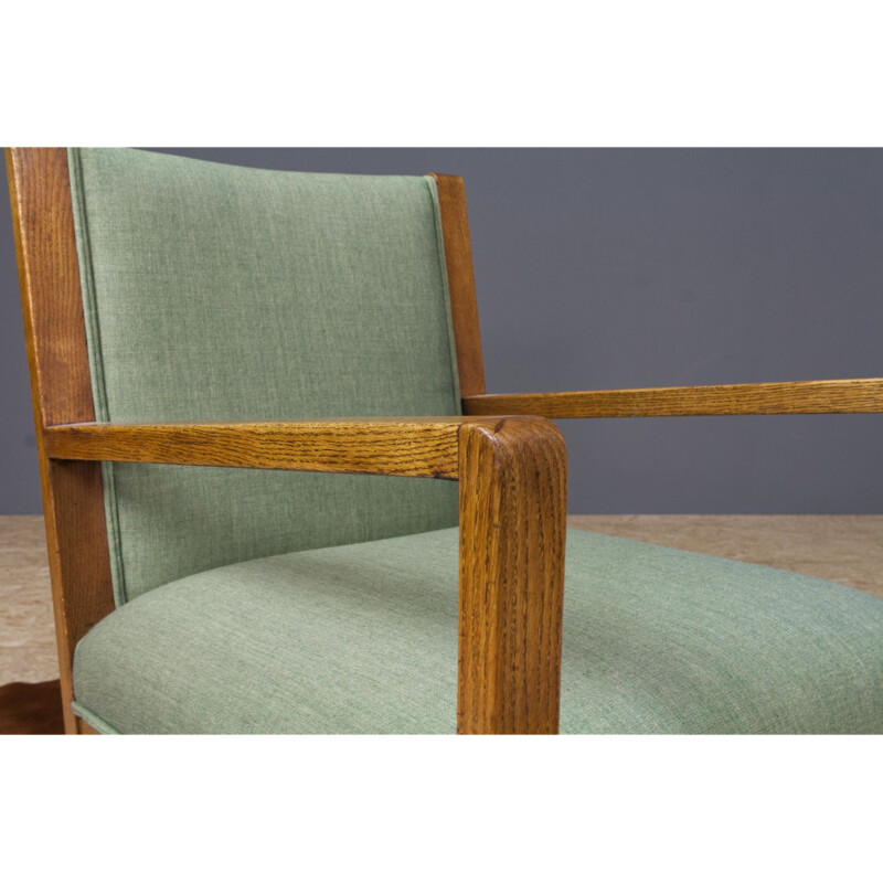 Vintage armchair in oak and green fabric