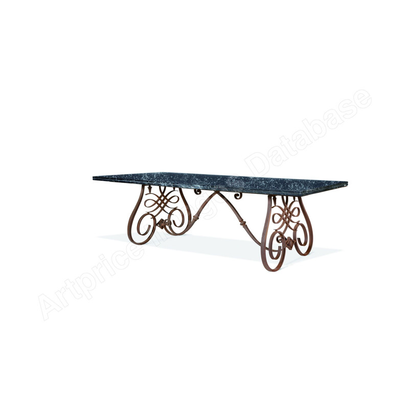 Vintage dining table by Raymond Subes