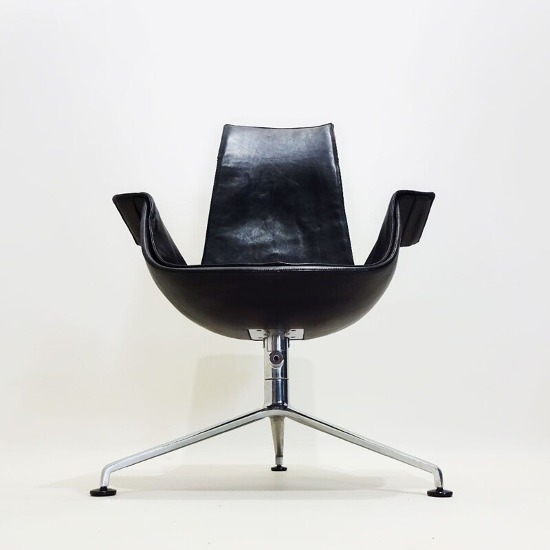 Vintage tulip chair in black leather tilting by Preben Fabricius and Jorgen Kastholm 1964s