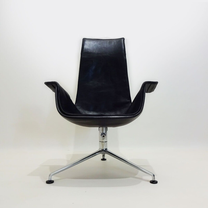 Vintage tulip chair in black leather tilting by Preben Fabricius and Jorgen Kastholm 1964s