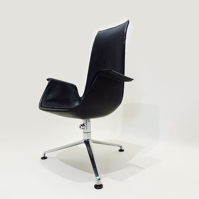 Vintage tulip chair in black leather tilting by Preben Fabricius and Jorgen Kastholm 1964s