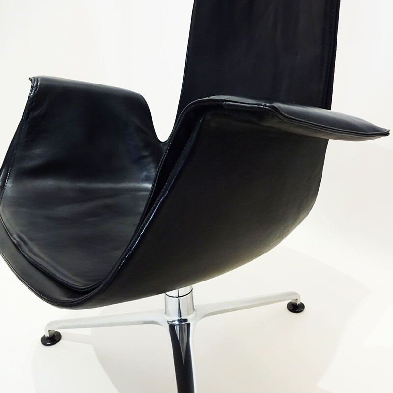 Vintage tulip chair in black leather tilting by Preben Fabricius and Jorgen Kastholm 1964s