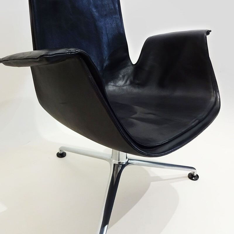 Vintage tulip chair in black leather tilting by Preben Fabricius and Jorgen Kastholm 1964s