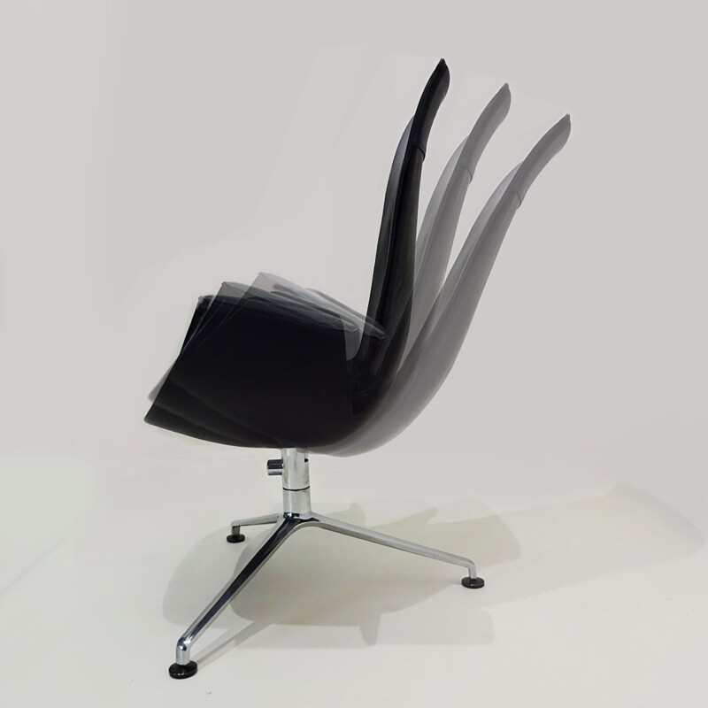 Vintage tulip chair in black leather tilting by Preben Fabricius and Jorgen Kastholm 1964s