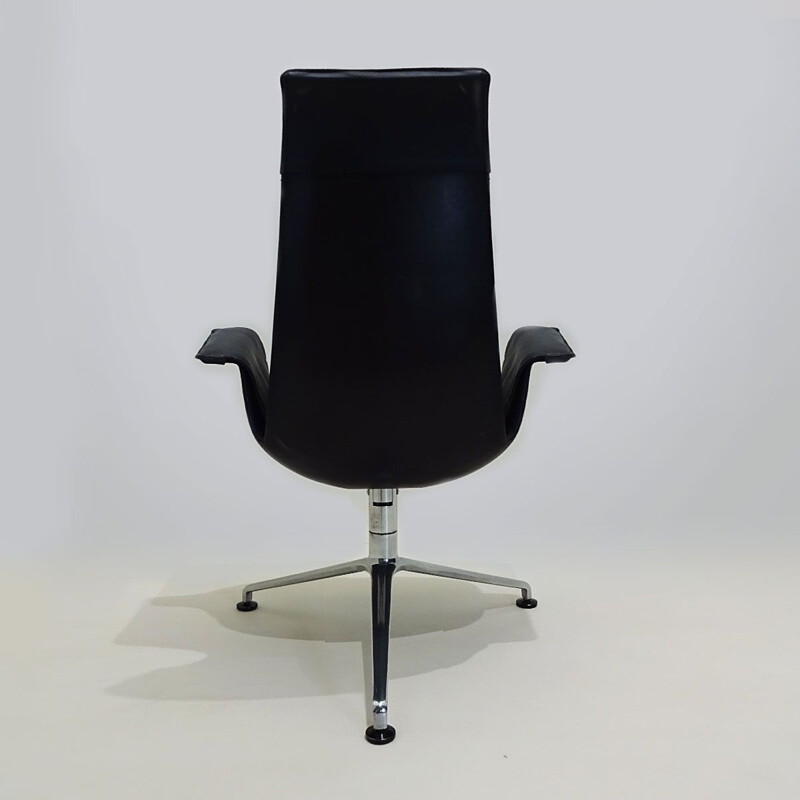 Vintage tulip chair in black leather tilting by Preben Fabricius and Jorgen Kastholm 1964s