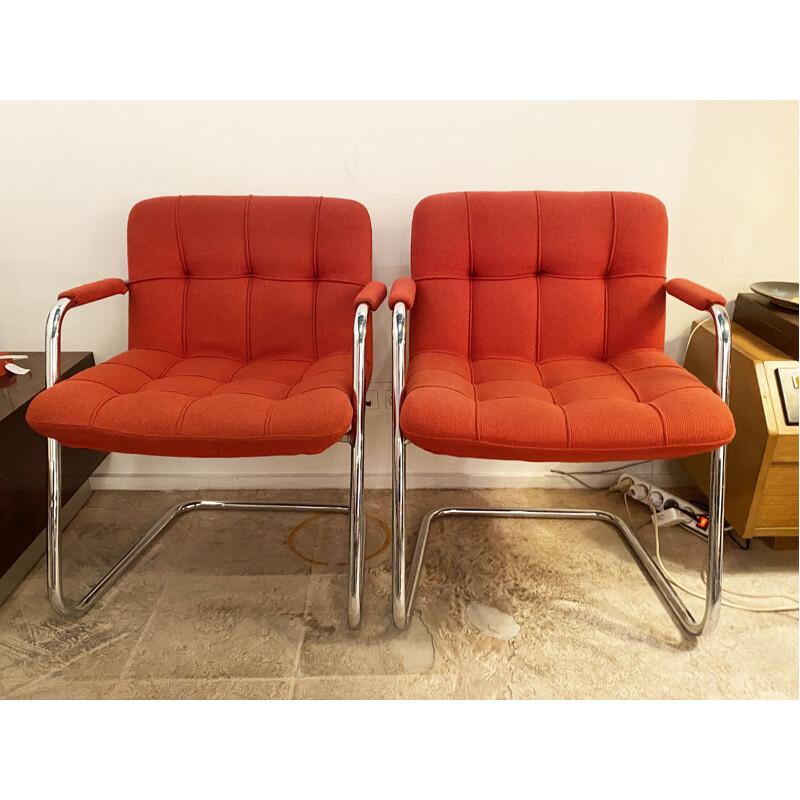 Pair of vintage red armchairs