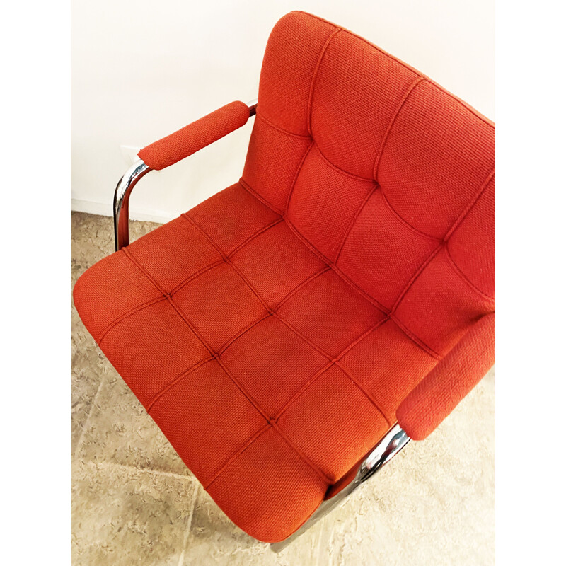 Pair of vintage red armchairs