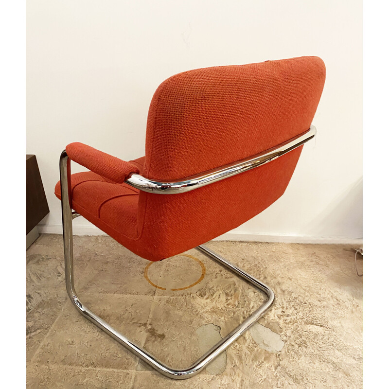 Pair of vintage red armchairs