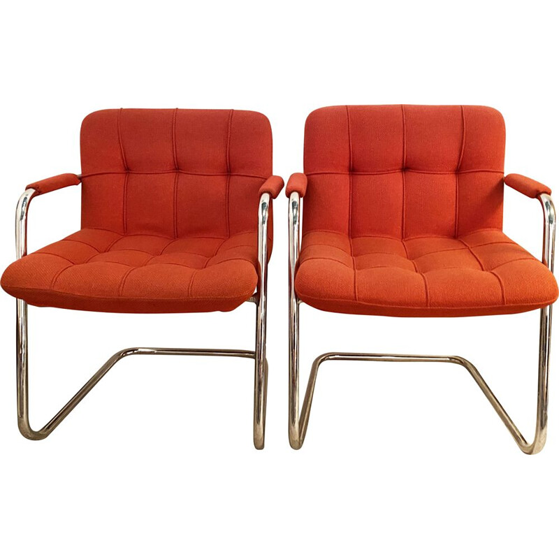 Pair of vintage red armchairs