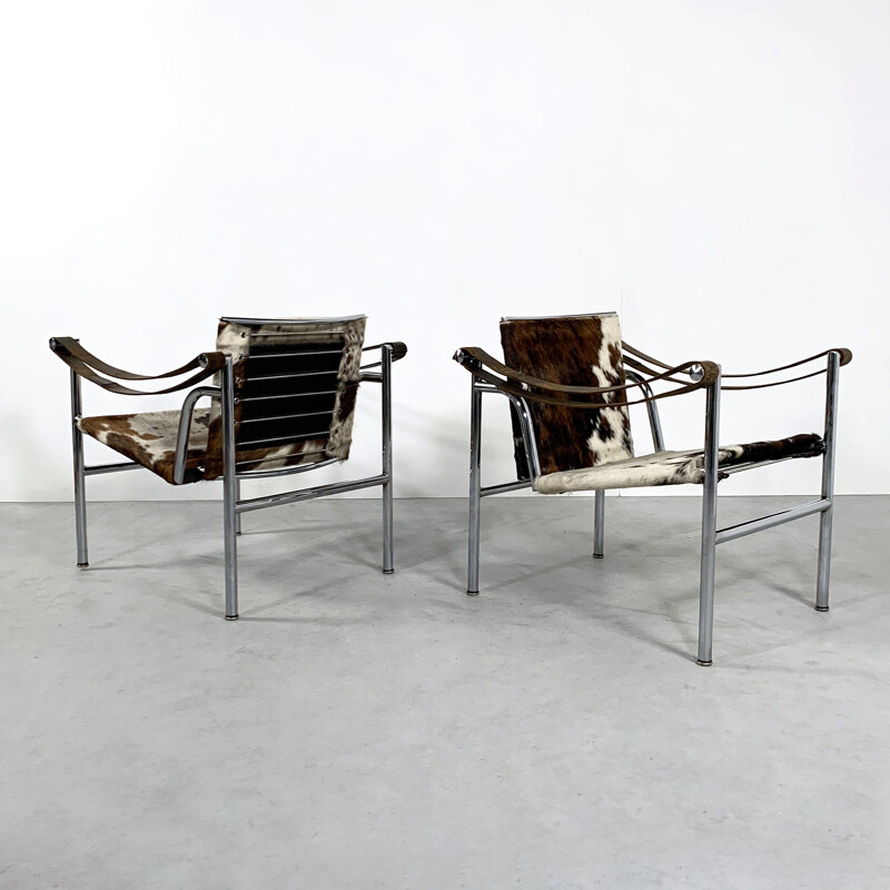Pair of vintage Cow Hide Armchairs by Le Corbusier for Cassina 1970s
