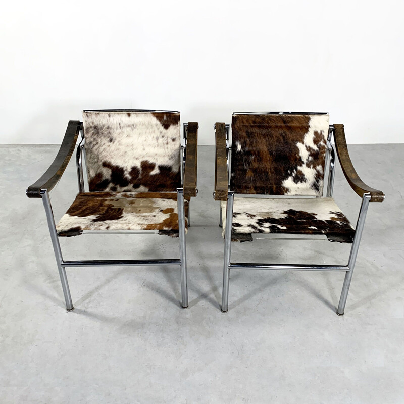 Pair of vintage Cow Hide Armchairs by Le Corbusier for Cassina 1970s