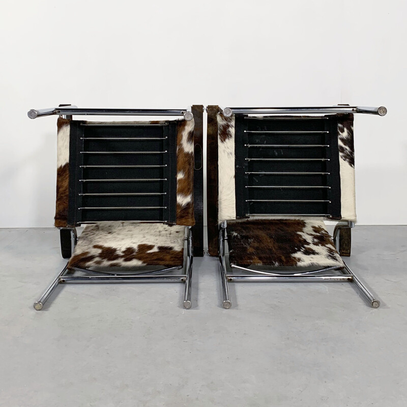 Pair of vintage Cow Hide Armchairs by Le Corbusier for Cassina 1970s